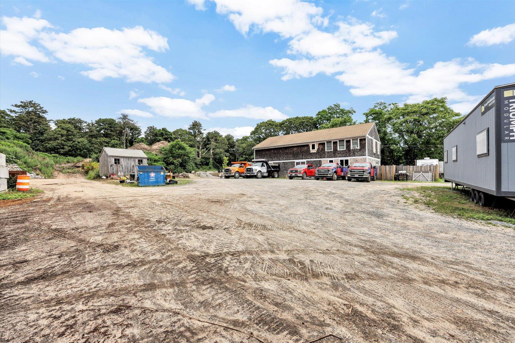 1562 State Hwy Route Eastham, MA 02642 - Photo 2 of 31 a view of street with parked cars