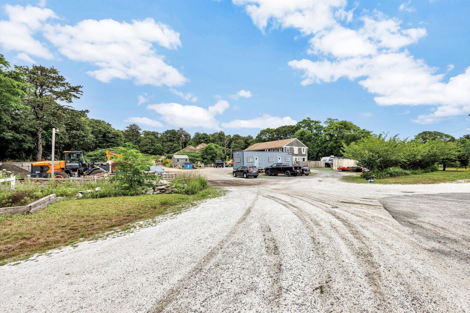 1562 State Hwy Route Eastham, MA 02642 - Photo 31 of 31 a car parked on the side of the road