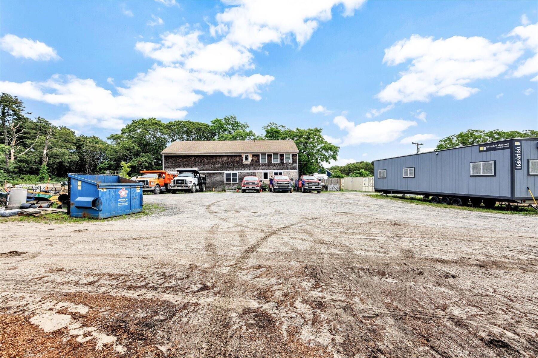 1562 State Hwy Route Eastham, MA 02642 - Photo 4 of 31 a view of street with parked cars
