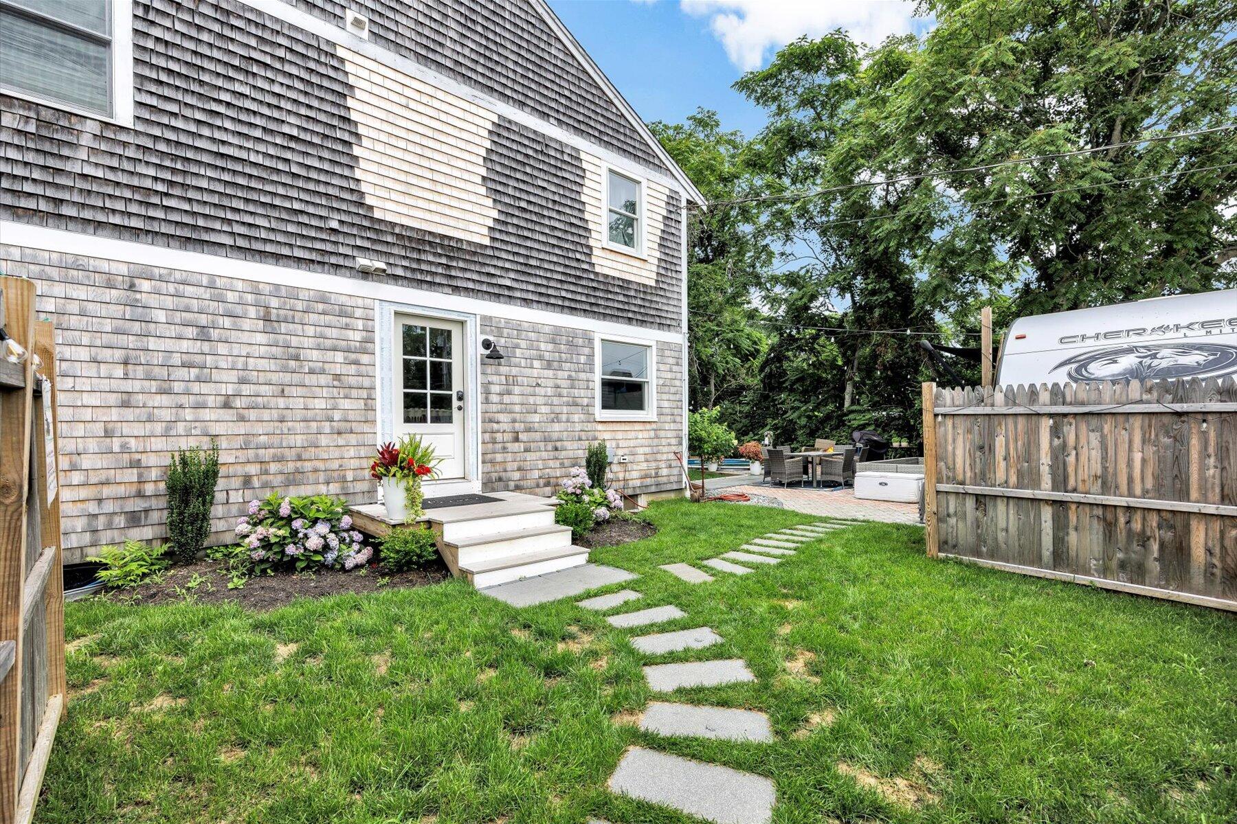 1562 State Hwy Route Eastham, MA 02642 - Photo 10 of 31 a view of a house with backyard
