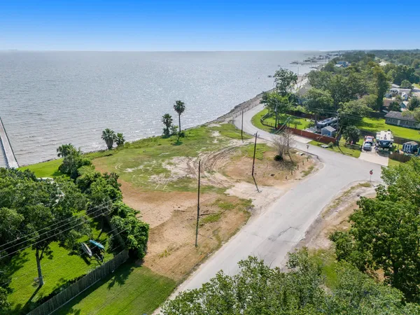a view of a swimming pool with an outdoor seating