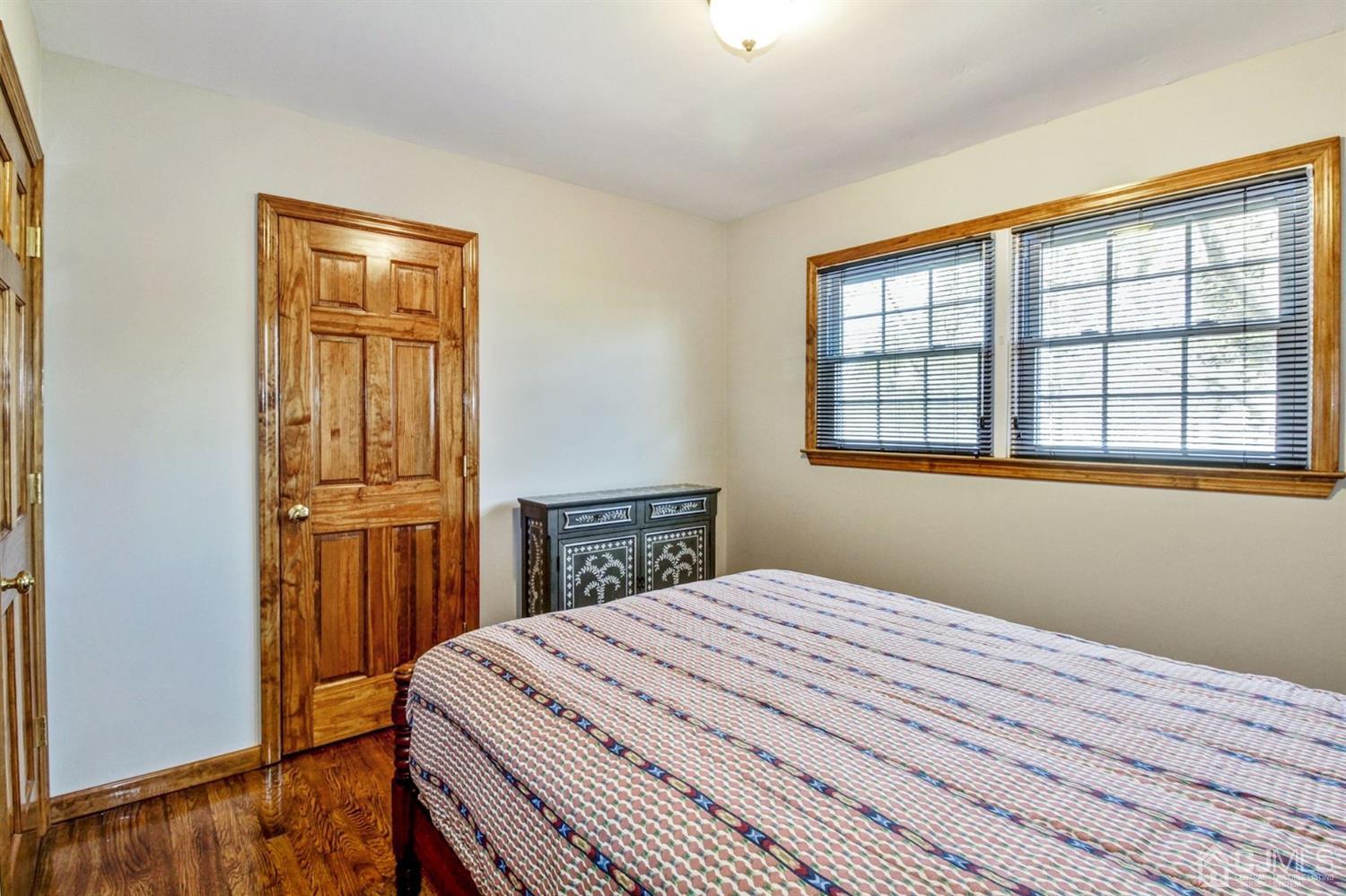 35 Rieder Road Edison, NJ 08817 - Photo 12 of 25 a bedroom with a bed and a window