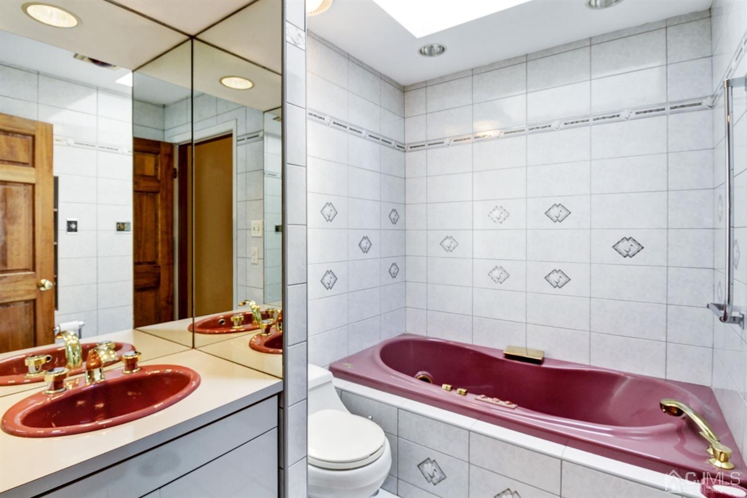 35 Rieder Road Edison, NJ 08817 - Photo 14 of 25 a bathroom with a sink a toilet and shower