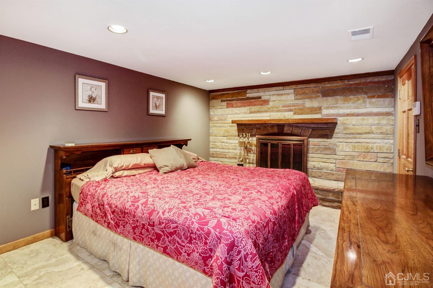 35 Rieder Road Edison, NJ 08817 - Photo 19 of 25 a bed room with a bed and a television