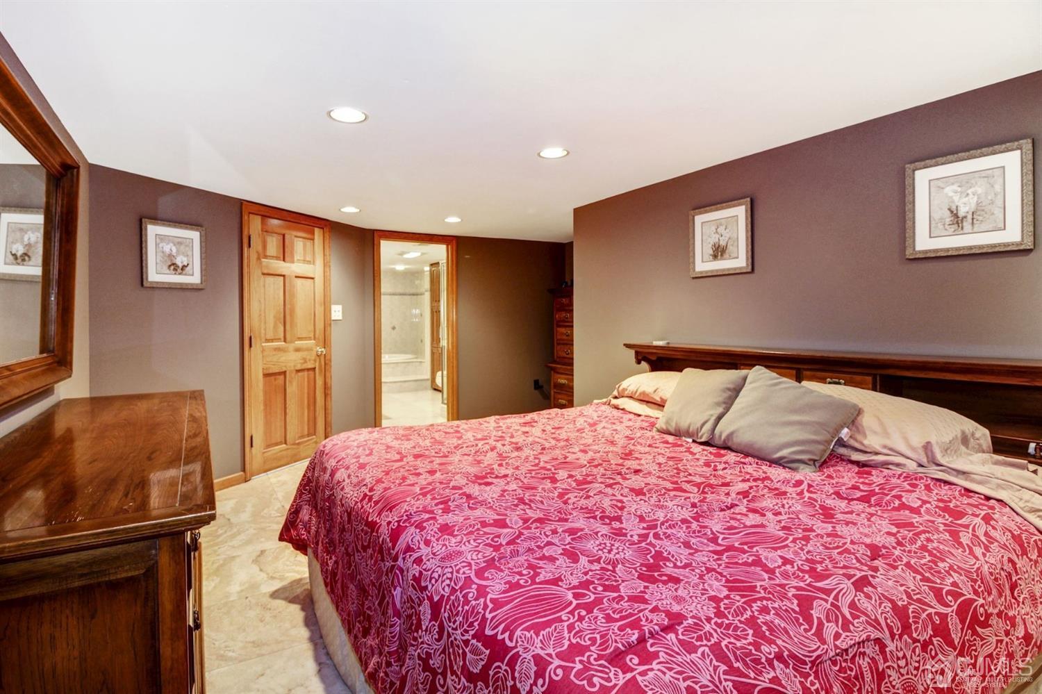 35 Rieder Road Edison, NJ 08817 - Photo 20 of 25 a bedroom with a large bed and a window