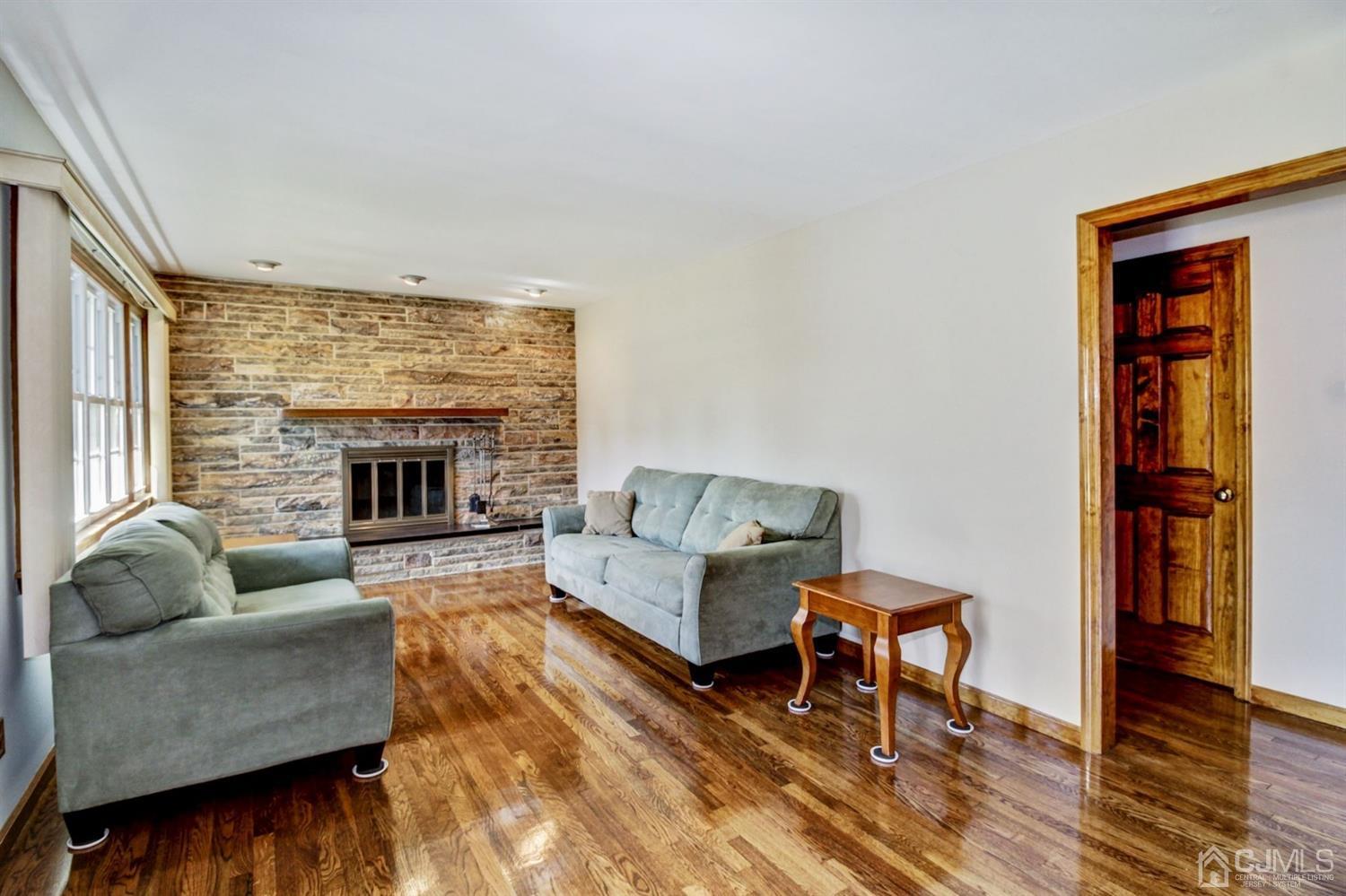 35 Rieder Road Edison, NJ 08817 - Photo 3 of 25 a living room with furniture and a fireplace