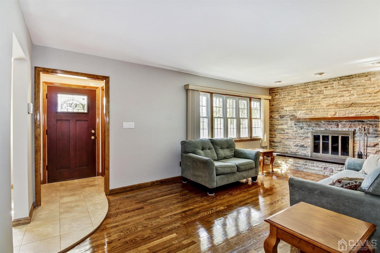 35 Rieder Road Edison, NJ 08817 - Photo 4 of 25 a living room with furniture and a fireplace