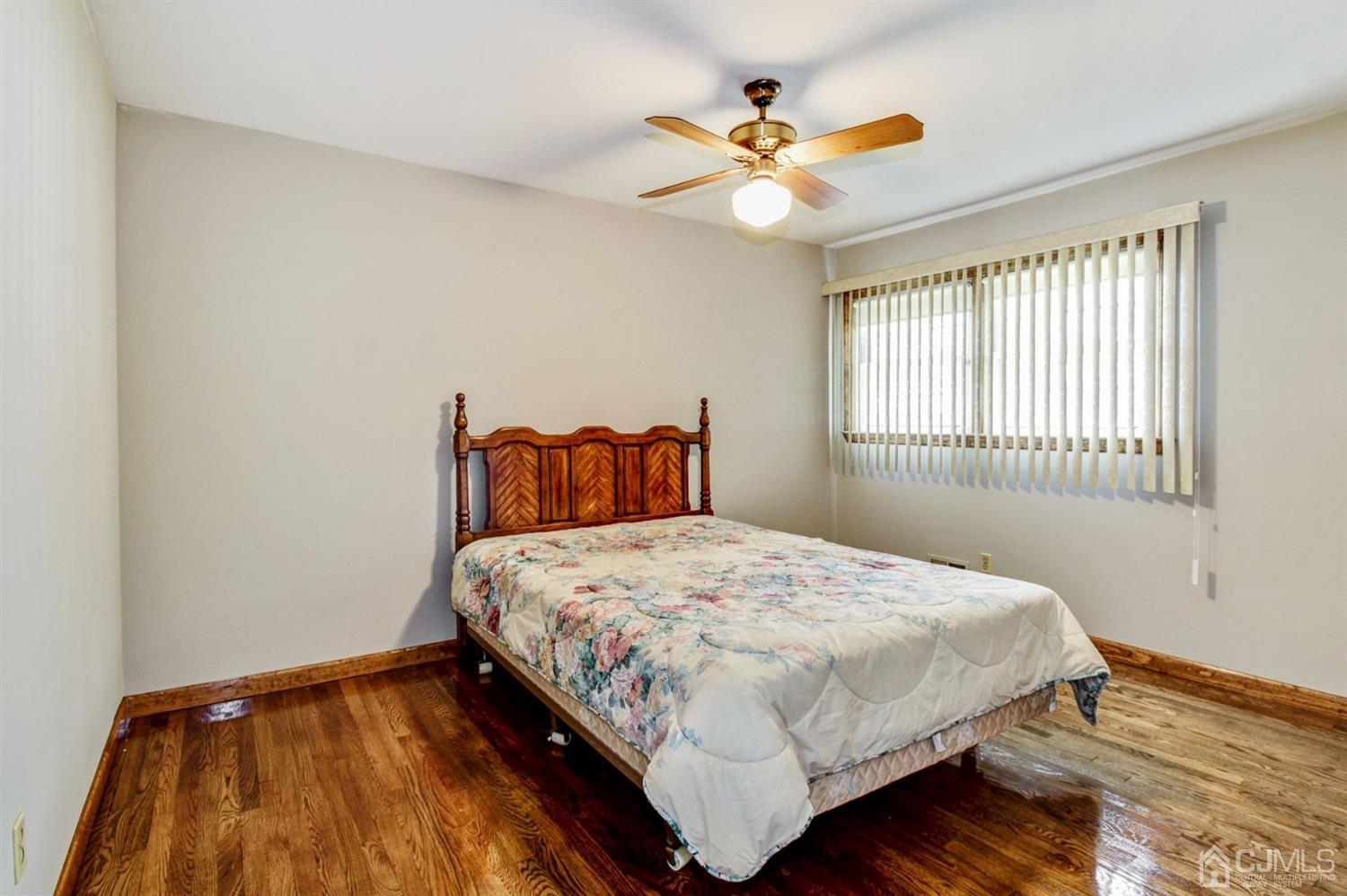 35 Rieder Road Edison, NJ 08817 - Photo 9 of 25 a bedroom with a bed and a window