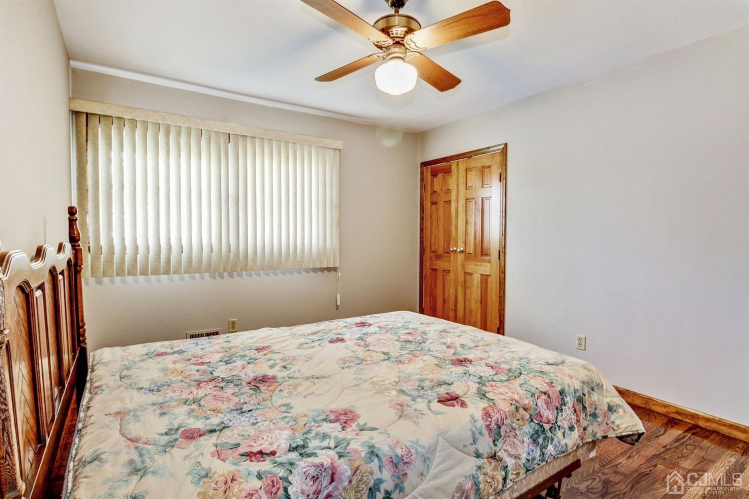 35 Rieder Road Edison, NJ 08817 - Photo 10 of 25 a bedroom with a bed and a window