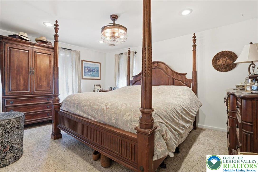 4880 Little Gap Road Kunkletown, PA 18058 - Photo 36 of 100 This cozy bedroom features carpeted flooring and recessed lighting.