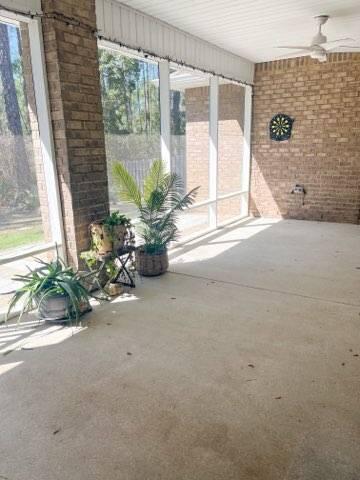 110 Conner Circle Santa Rosa Beach, FL 32459 - Photo 24 of 26 a view of a potted plant in front of a window
