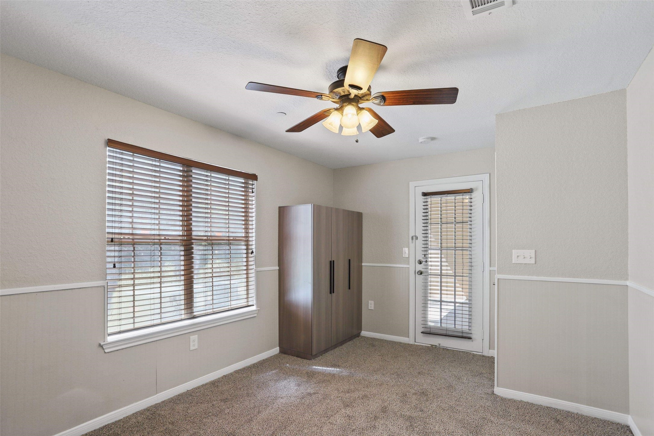 11700 League Line Road, Unit 122 Conroe, TX 77304 - Photo 17 of 25 a view of an empty room with a window
