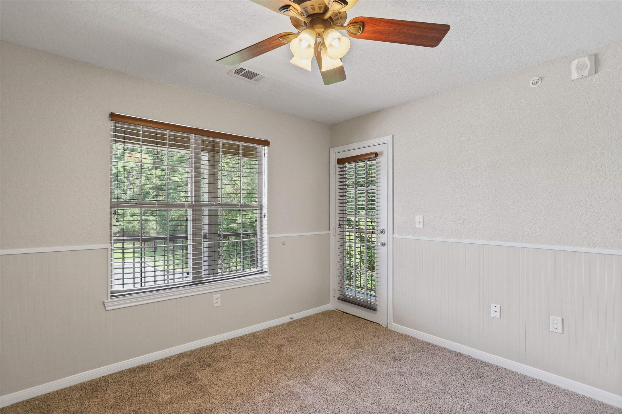 11700 League Line Road, Unit 122 Conroe, TX 77304 - Photo 19 of 25 a view of an empty room with a window