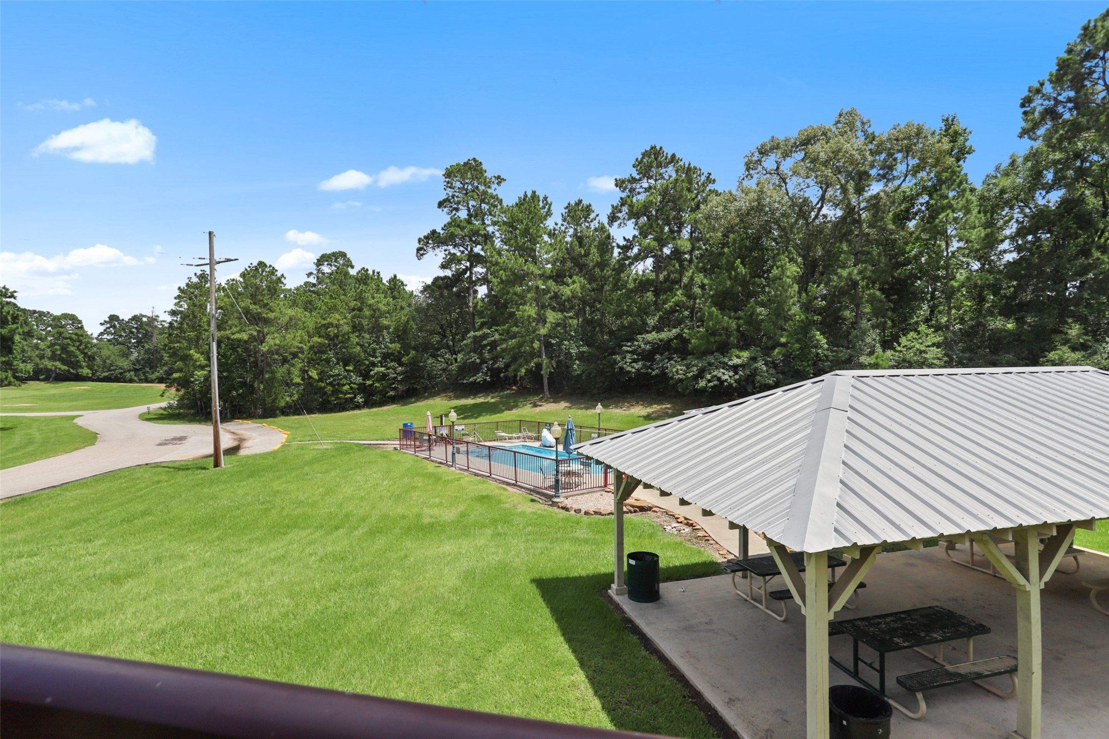 11700 League Line Road, Unit 122 Conroe, TX 77304 - Photo 22 of 25 a view of a backyard with swimming pool