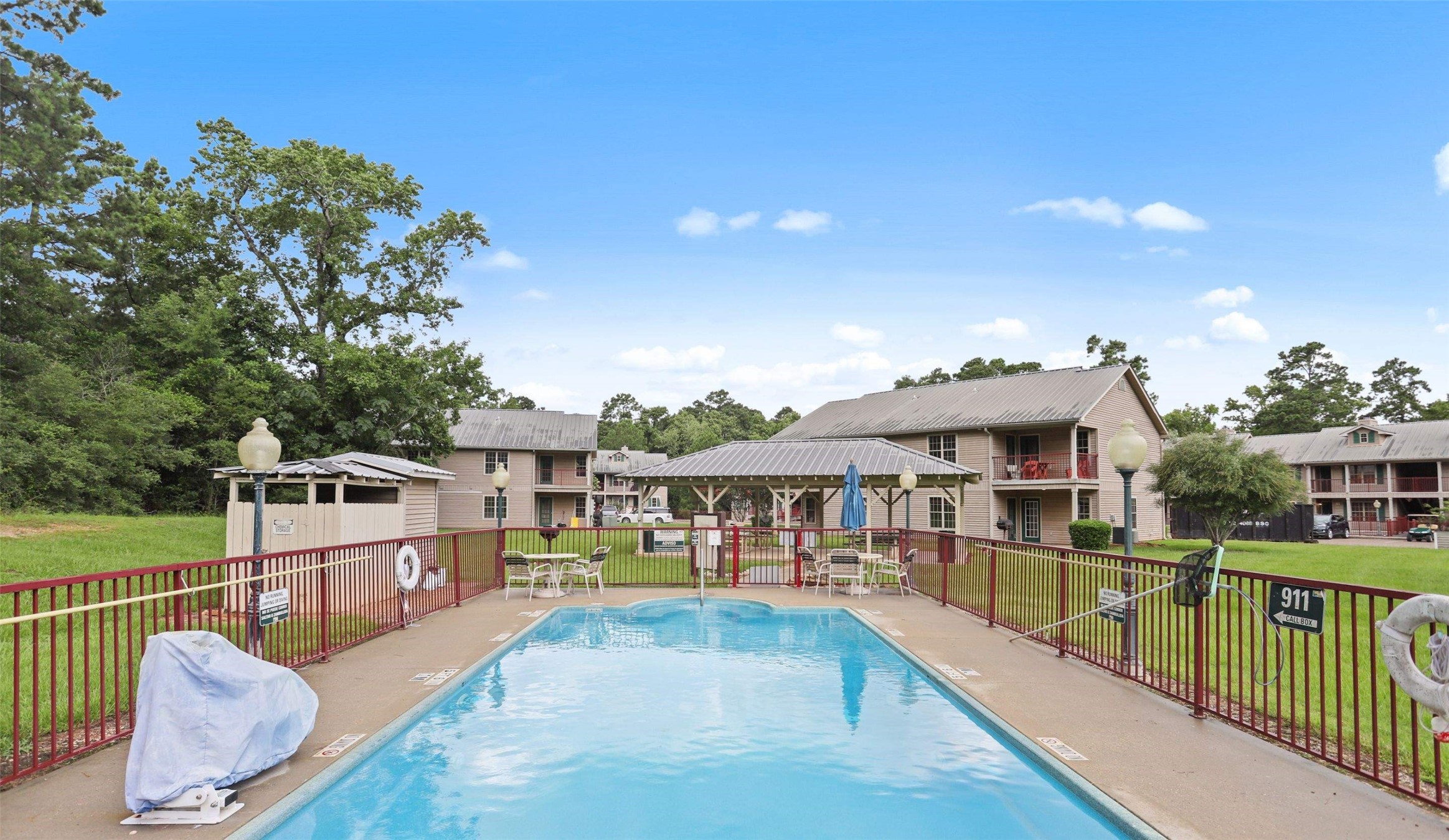 11700 League Line Road, Unit 122 Conroe, TX 77304 - Photo 25 of 25 a view of a house with a swimming pool