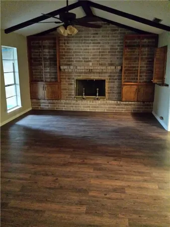 a living room with a fireplace