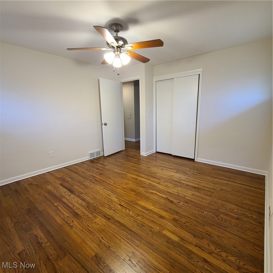 12204 Grannis Road Garfield Heights, OH 44125 - Photo 11 of 22 Mater bedroom features spacious closet space and updated ceiling fan fixture
