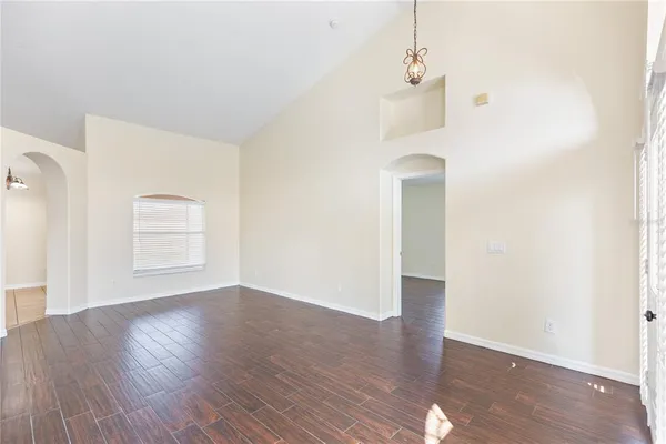 a kitchen with stainless steel appliances granite countertop a sink and a microwave