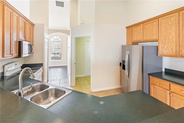a spacious bathroom with a large tub and shower