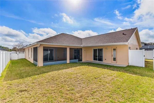 a view of a yard in front of a house