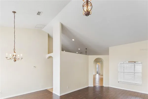 a kitchen with stainless steel appliances granite countertop a sink and a stove