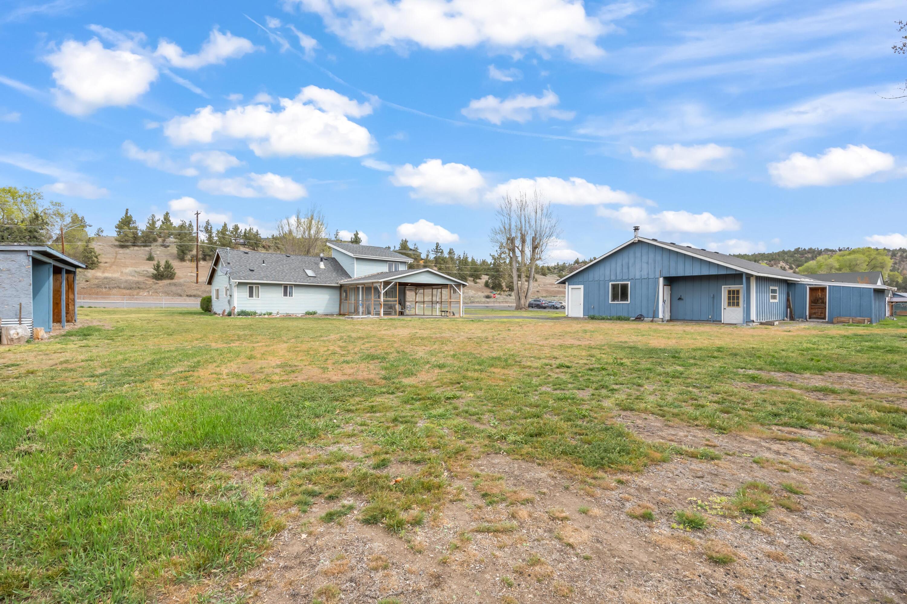 2010 Northeast Laughlin Road Prineville, OR 97754 - Photo 34 of 39 a house view with swimming pool in front of it