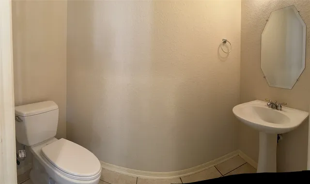 a bathroom with a sink and a toilet