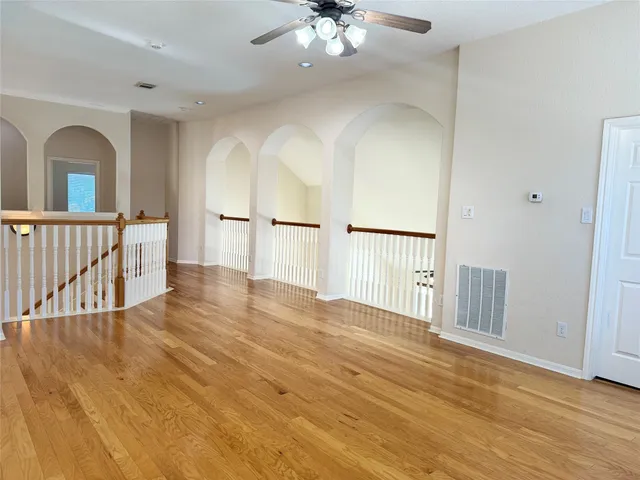 a view of entryway with wooden floor