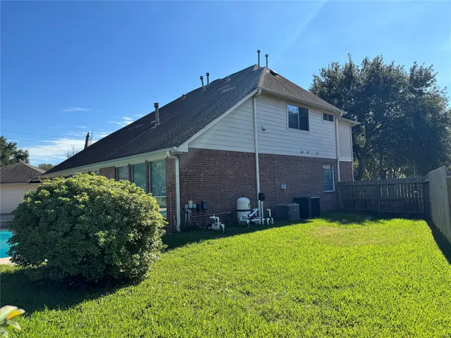 a view of a backyard with a garden