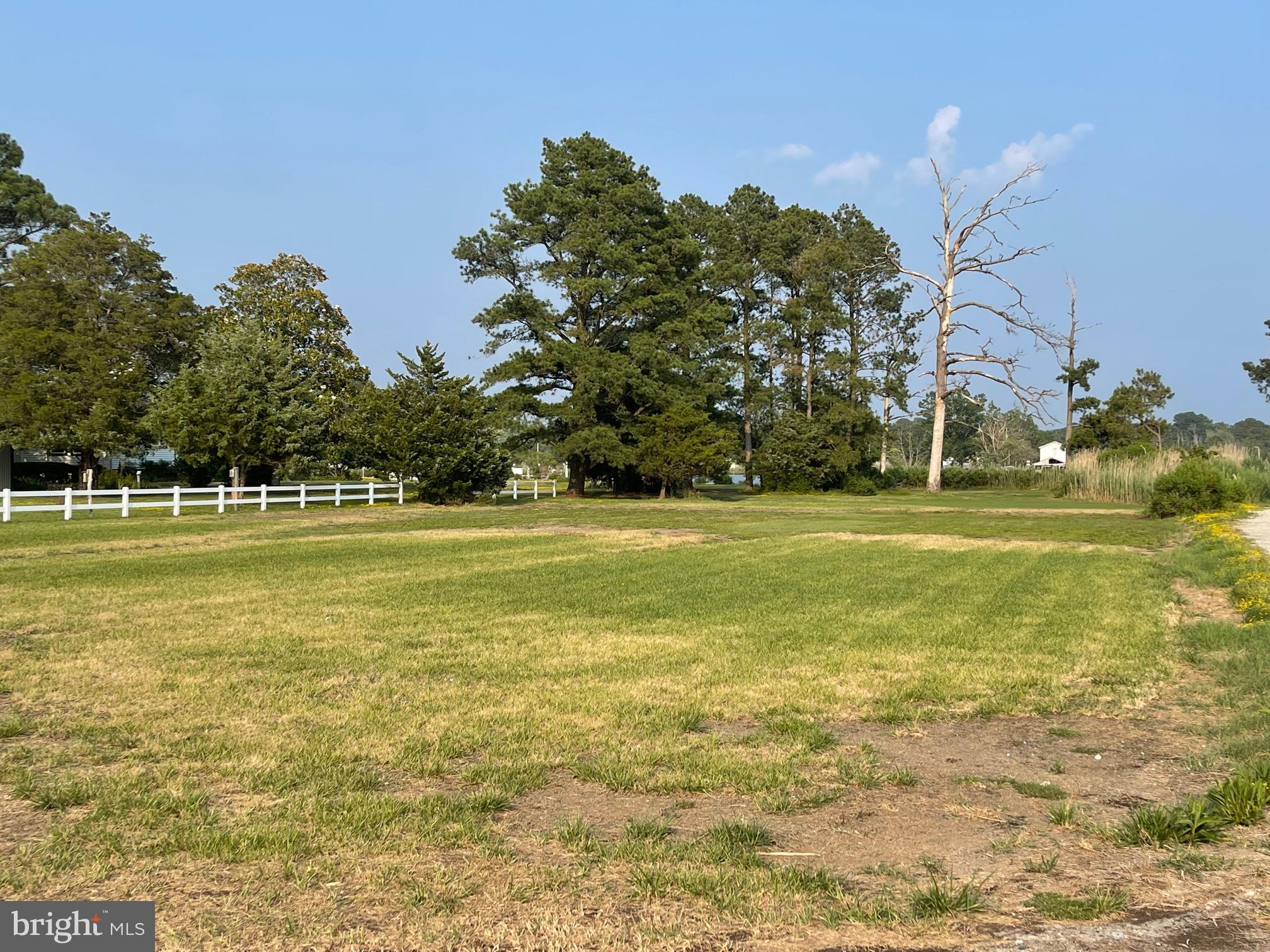 0 Annie Hyland Road Princess Anne, MD 21853 - Photo 3 of 5 a view of a swimming pool with an outdoor space and seating area