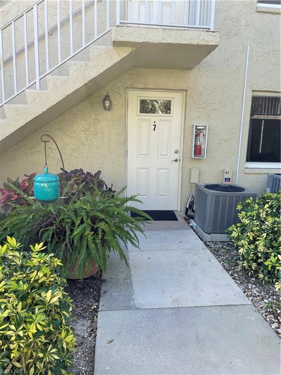 200 Palm Drive, Unit 7 Naples, FL 34112 - Photo 15 of 21 a view of a entryway door of the house