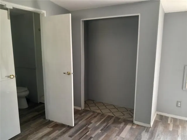 a view of bathroom with a toilet sink and shower