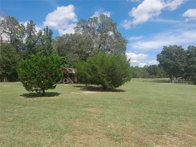 a view of outdoor space and yard