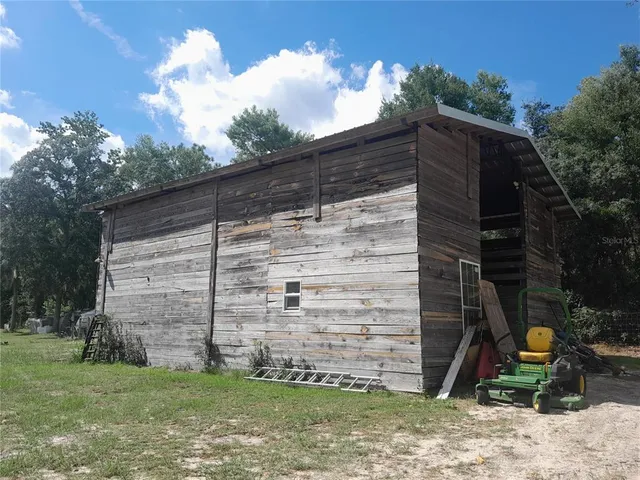 a view of outdoor space and yard