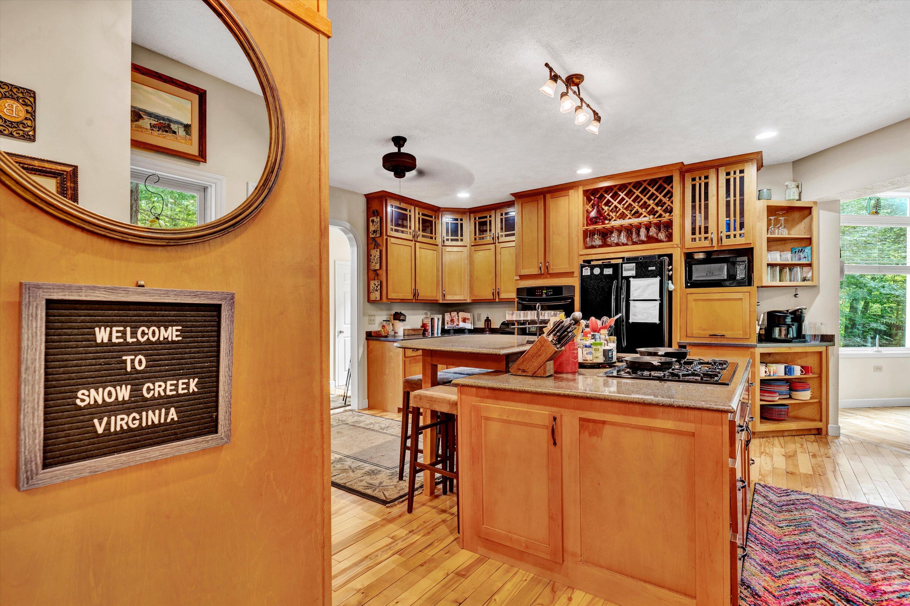 11289 Sontag Road Martinsville, VA 24112 - Photo 17 of 55 a view of a living room and a window