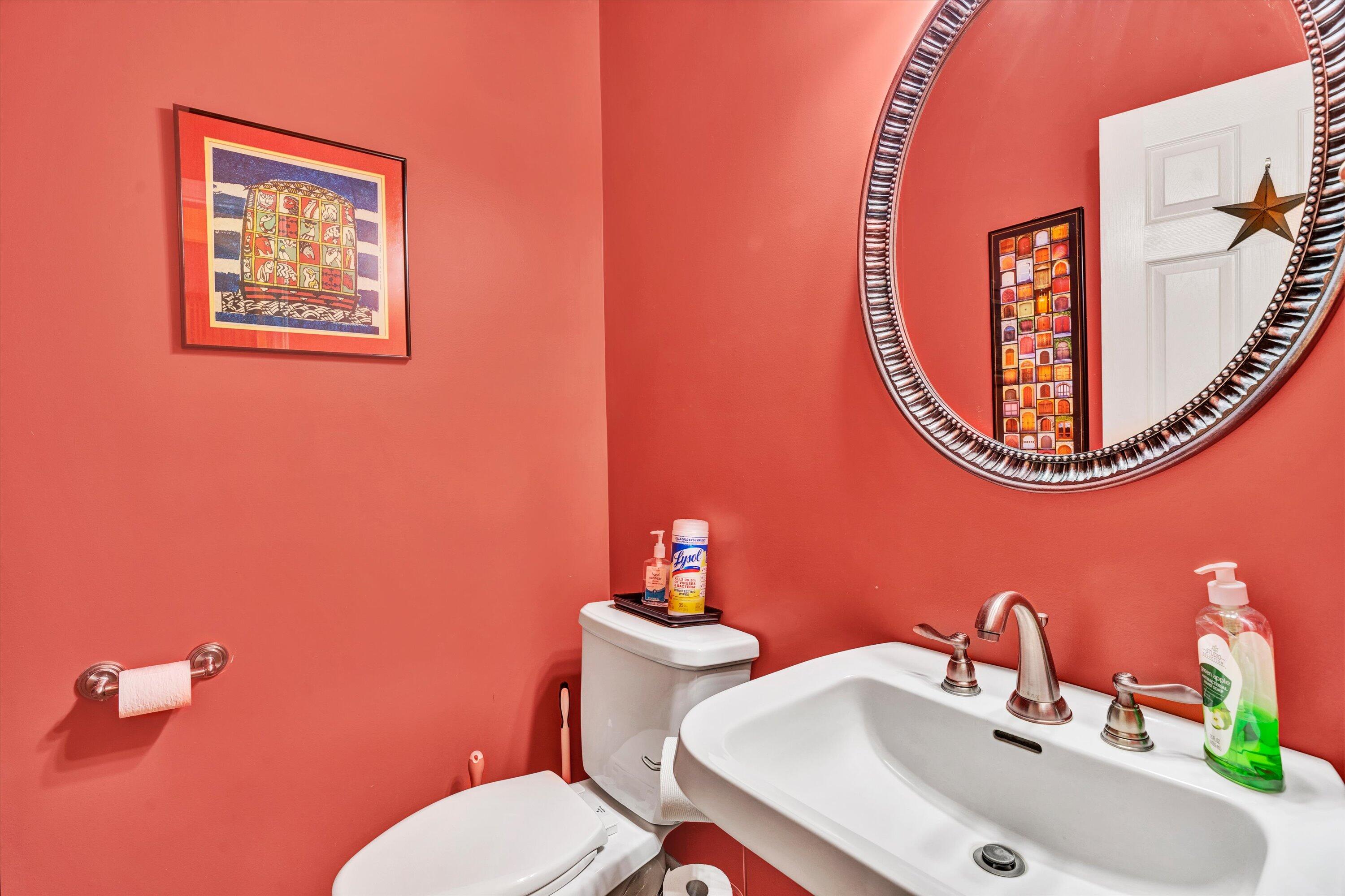 11289 Sontag Road Martinsville, VA 24112 - Photo 29 of 55 a bathroom with a toilet a sink and a mirror