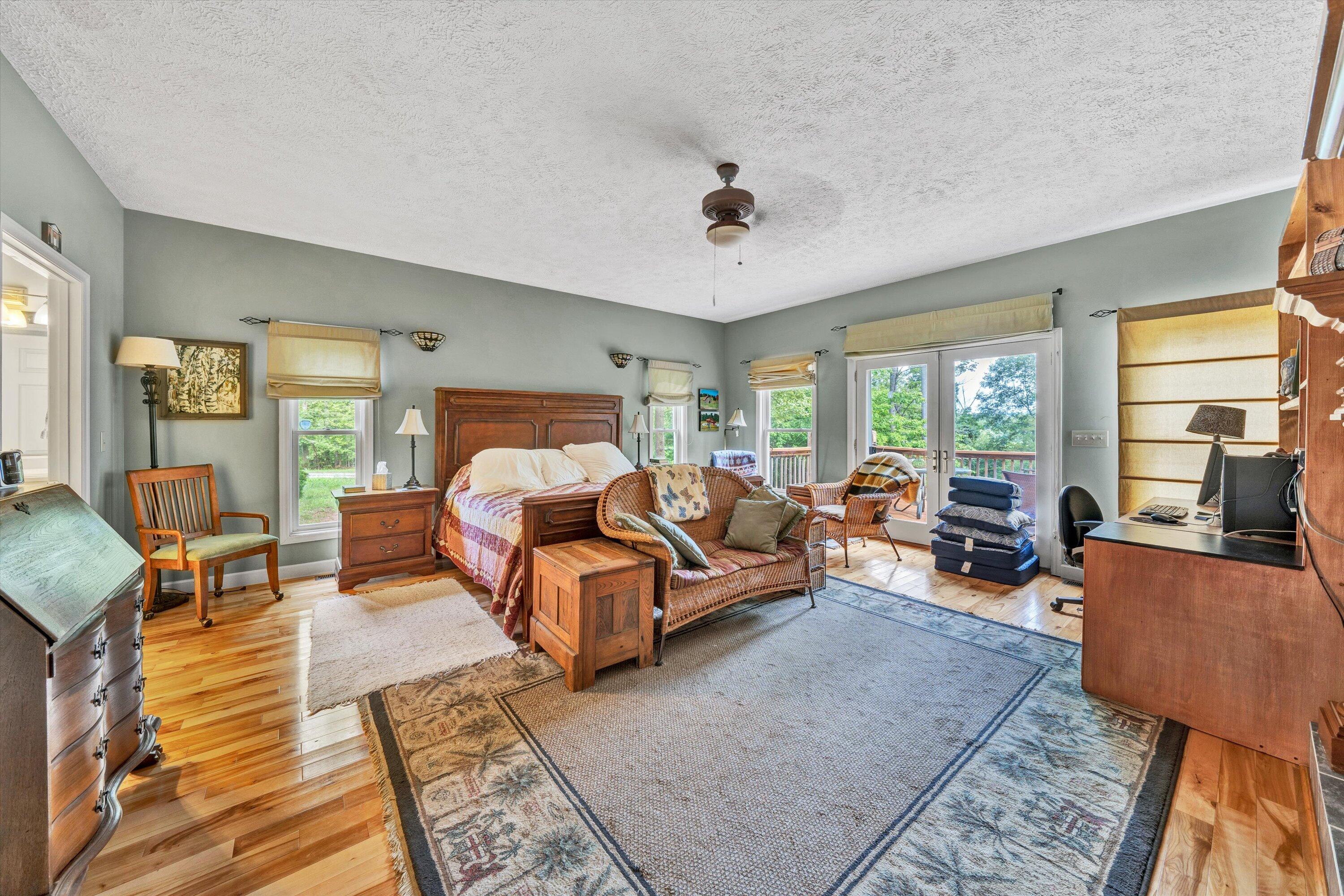 11289 Sontag Road Martinsville, VA 24112 - Photo 30 of 55 a bed room with furniture and a large window