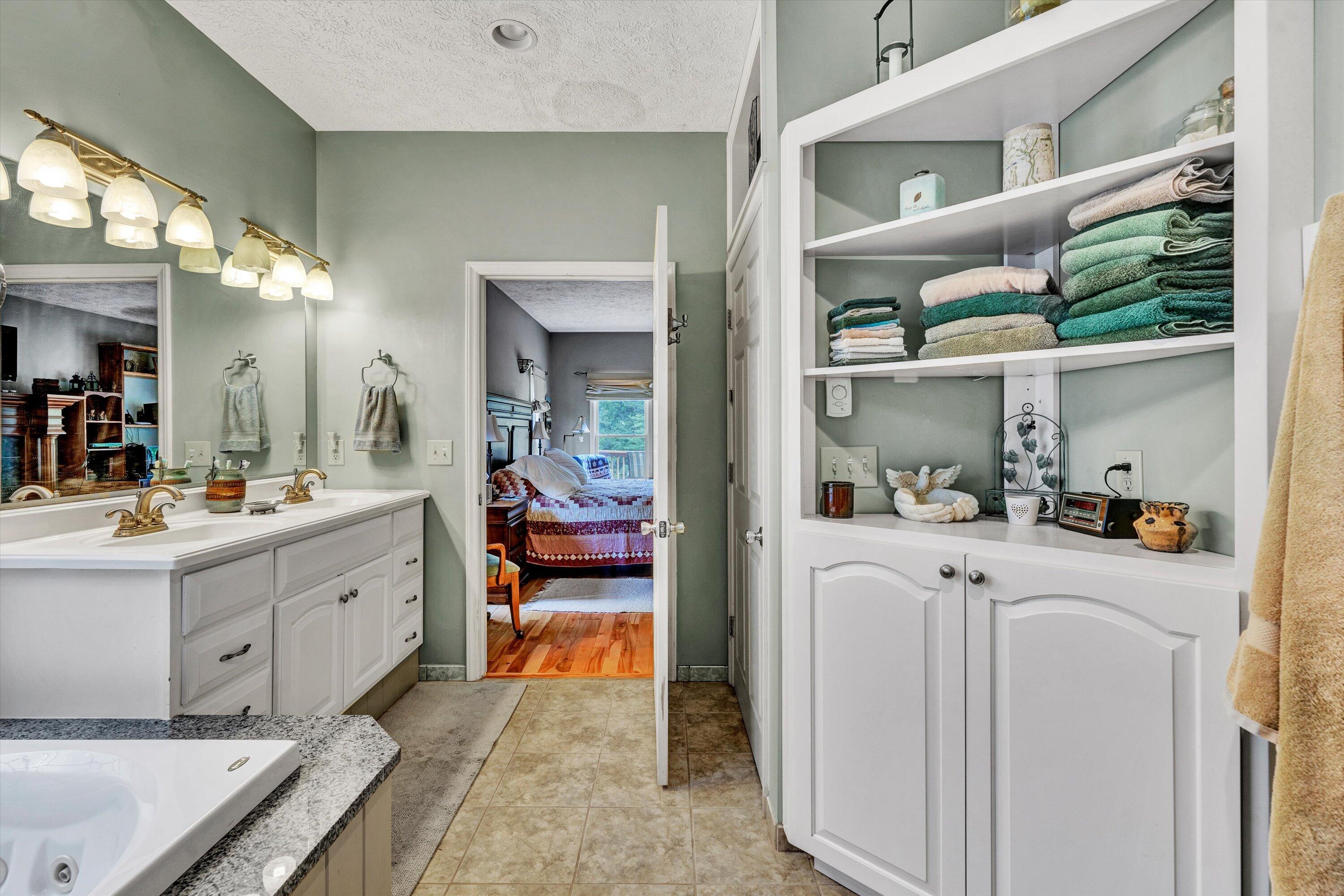 11289 Sontag Road Martinsville, VA 24112 - Photo 34 of 55 a large white kitchen with cabinets