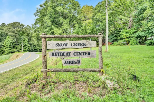 a sign on the side of the road