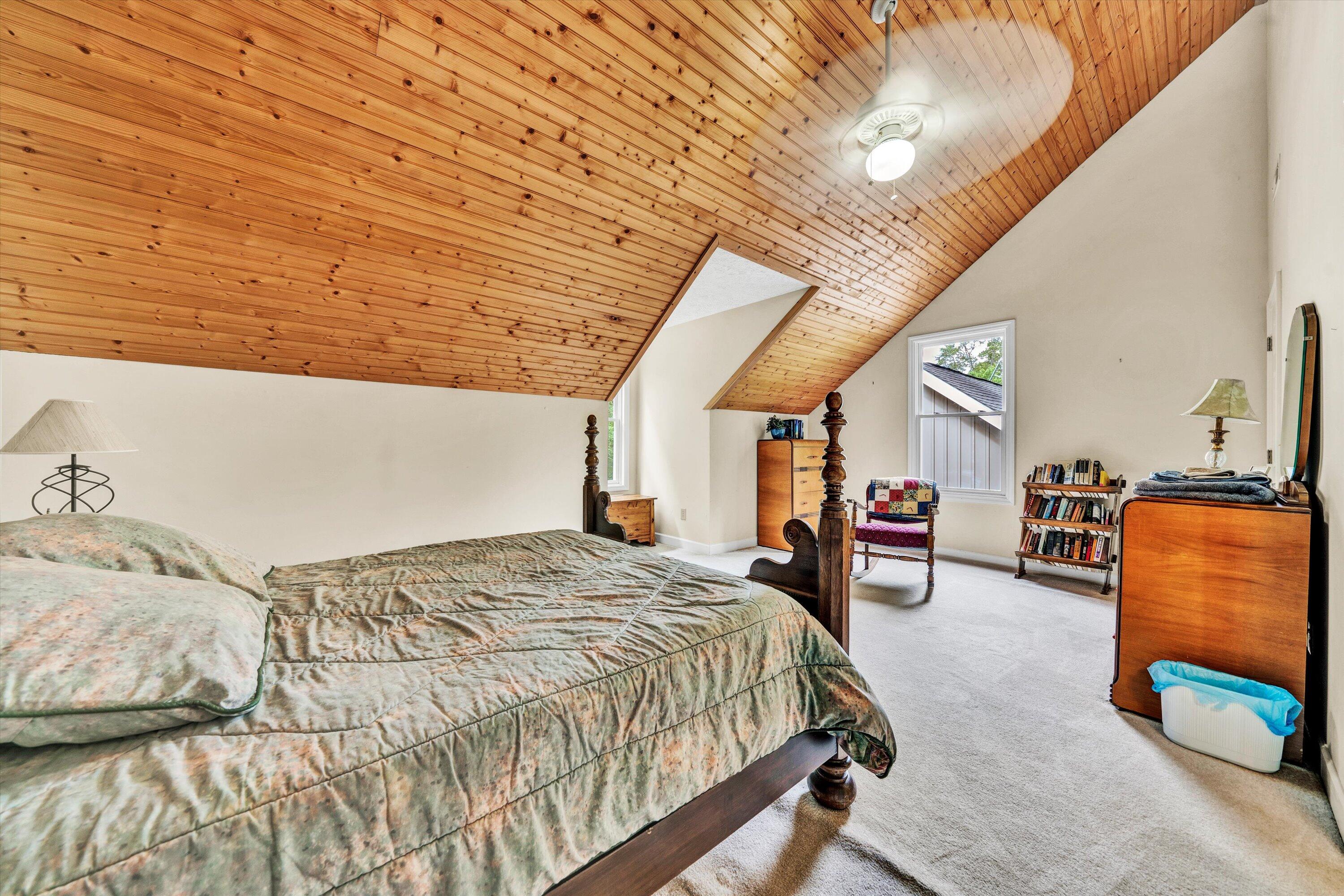 11289 Sontag Road Martinsville, VA 24112 - Photo 43 of 55 a bed sitting in a spacious bedroom next to a larger window