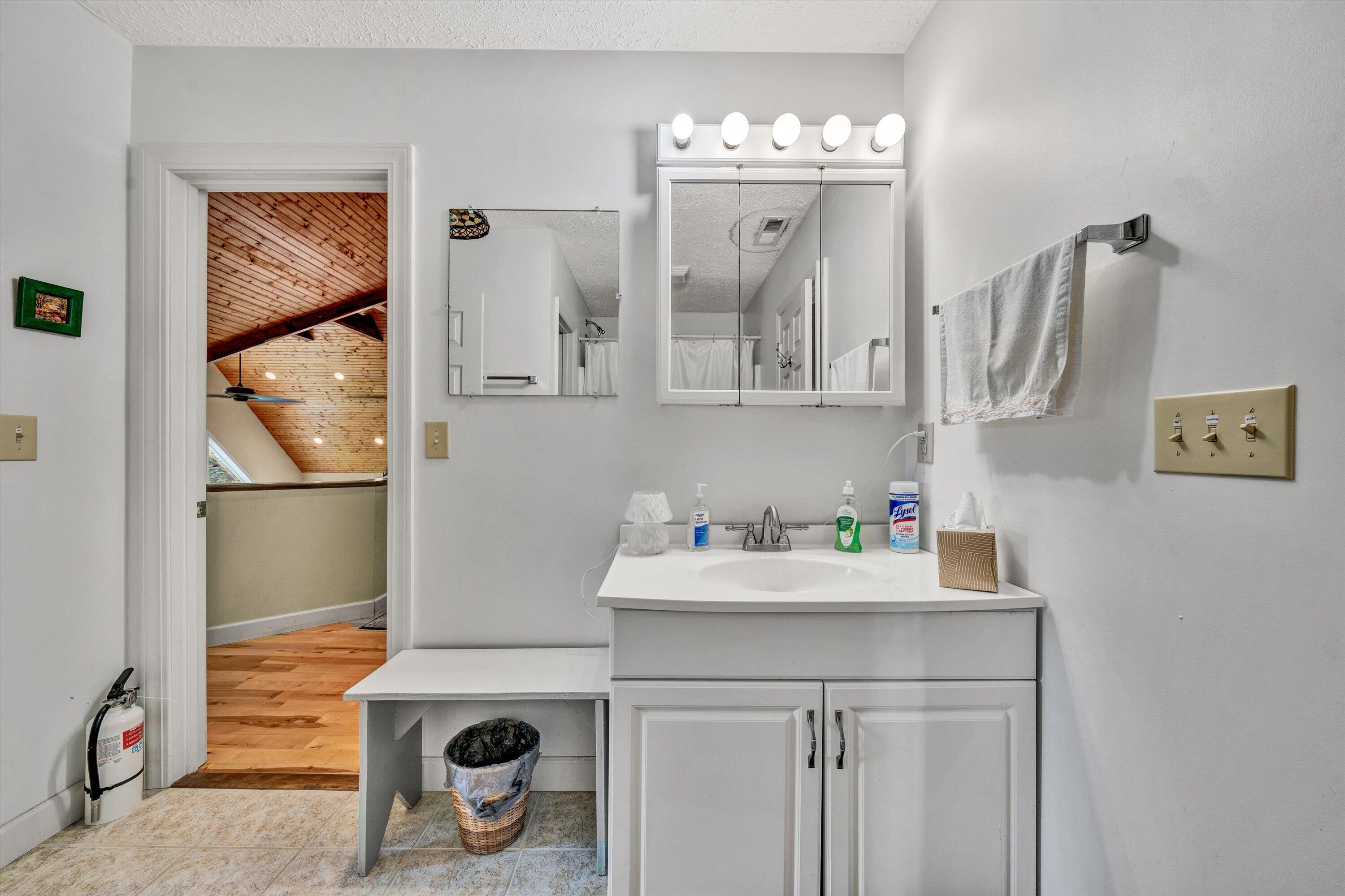 11289 Sontag Road Martinsville, VA 24112 - Photo 46 of 55 a bathroom with a sink mirror and vanity