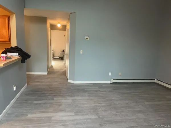 a view of an empty room and window