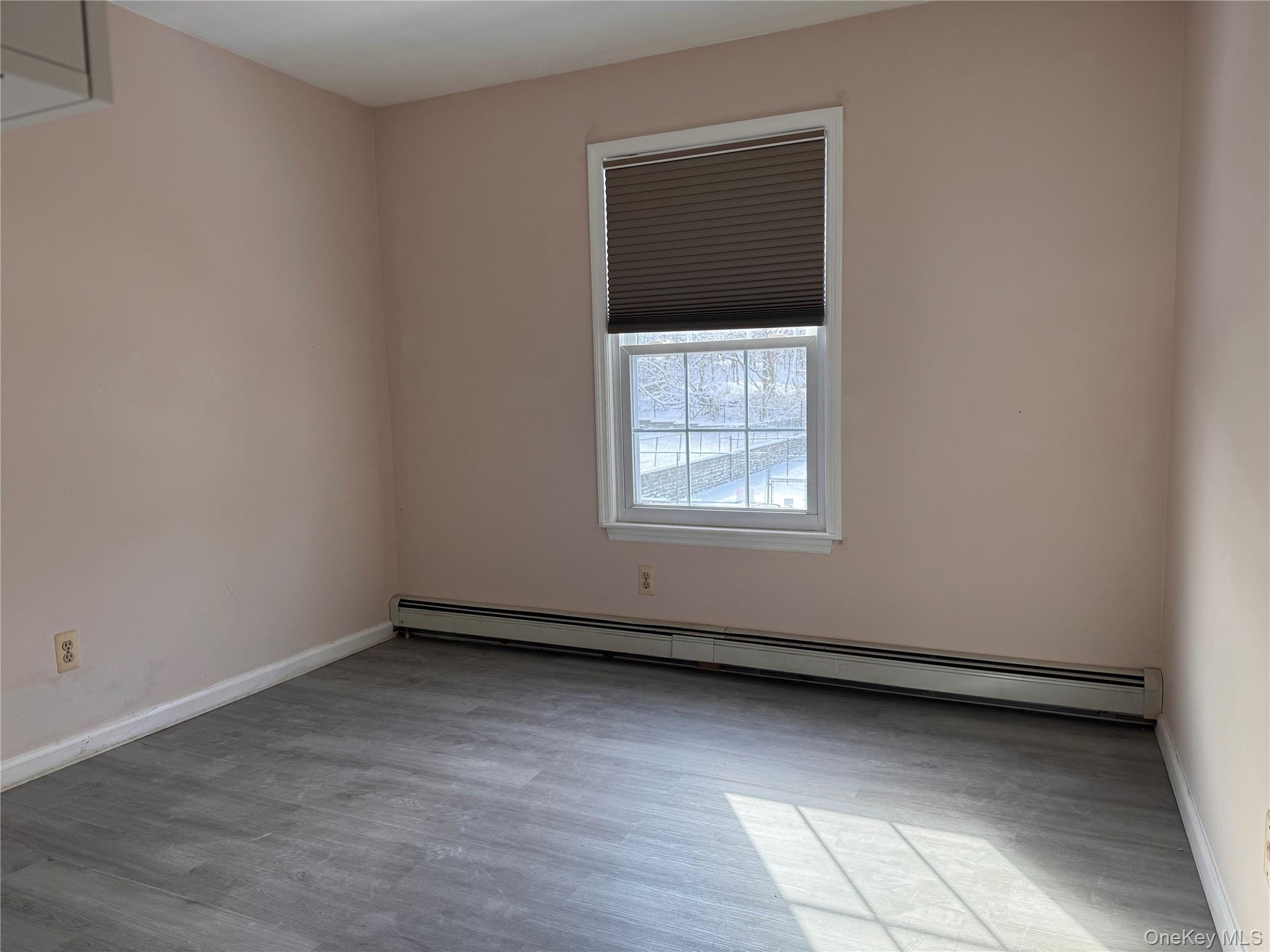 4 Lexington Hills Road, Unit 6 Harriman, NY 10926 - Photo 16 of 19 an empty room with a window