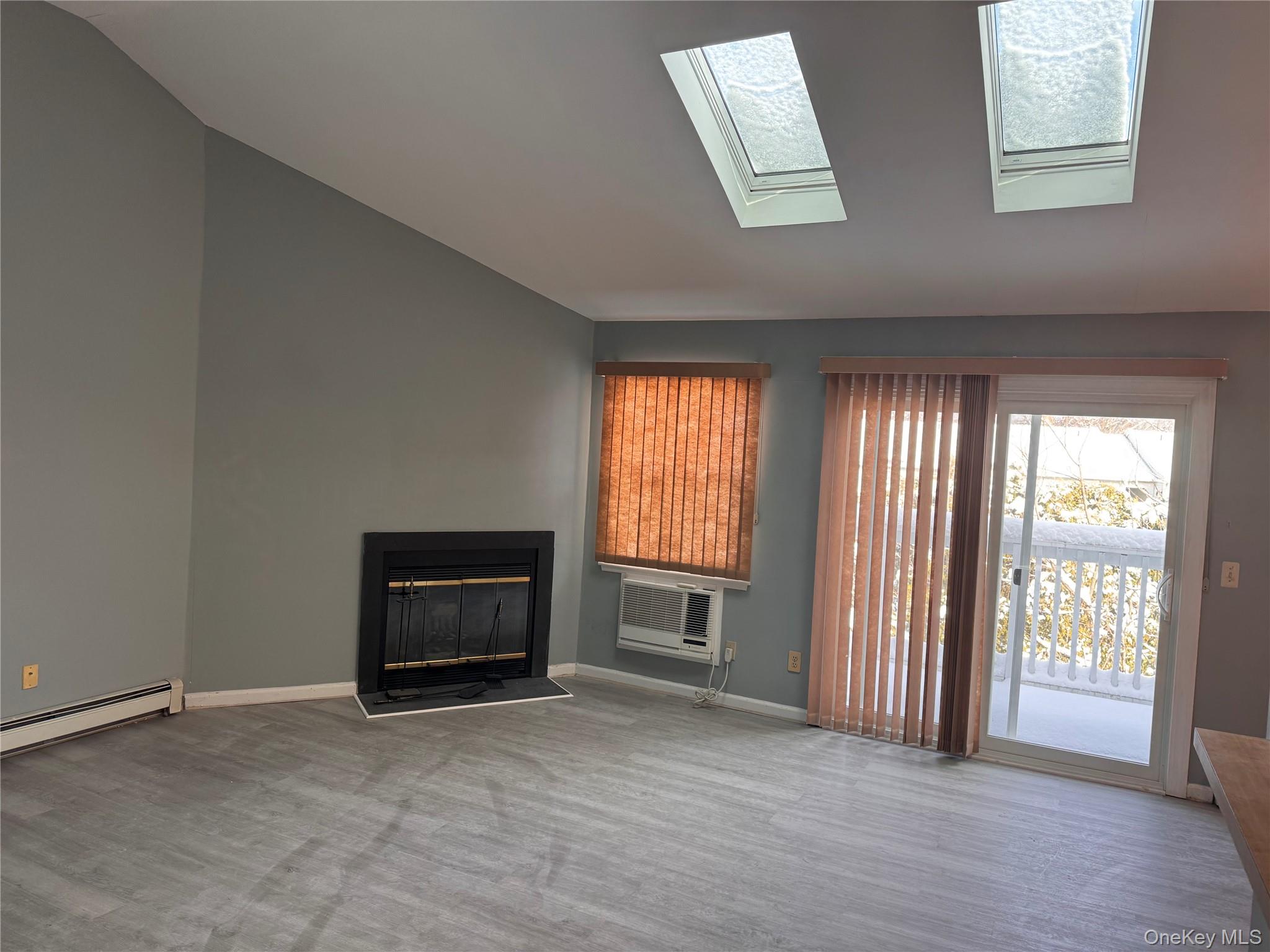 4 Lexington Hills Road, Unit 6 Harriman, NY 10926 - Photo 2 of 19 an empty room with windows