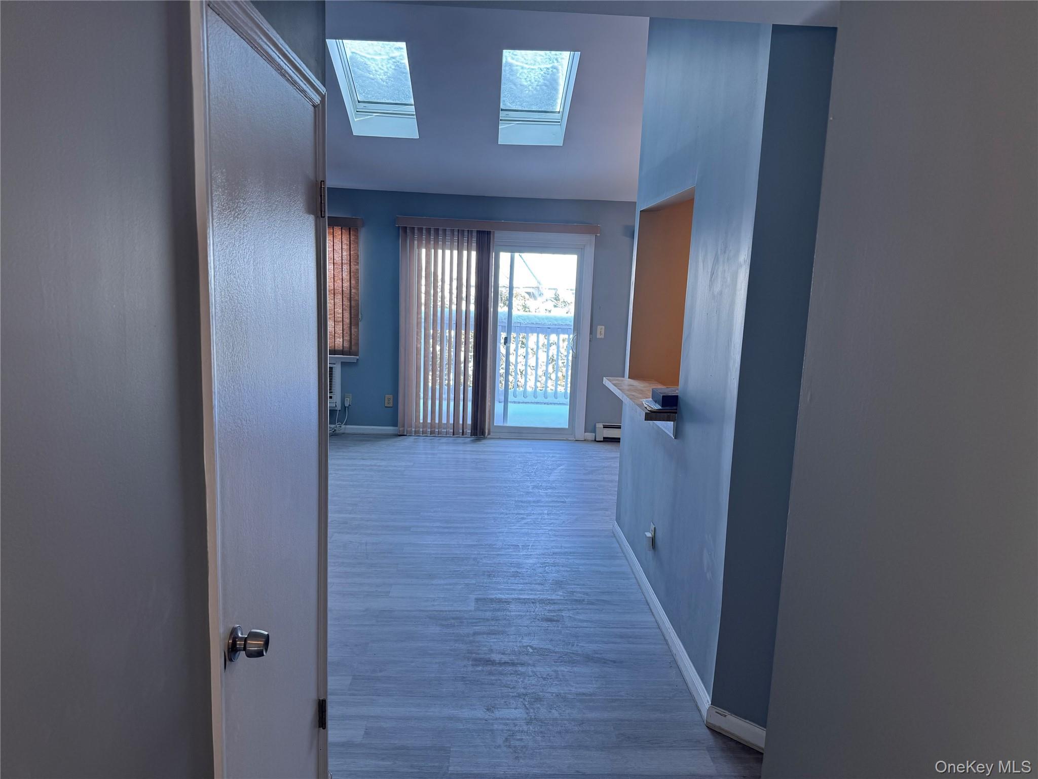 4 Lexington Hills Road, Unit 6 Harriman, NY 10926 - Photo 8 of 19 a view of a hallway with wooden floor and closet