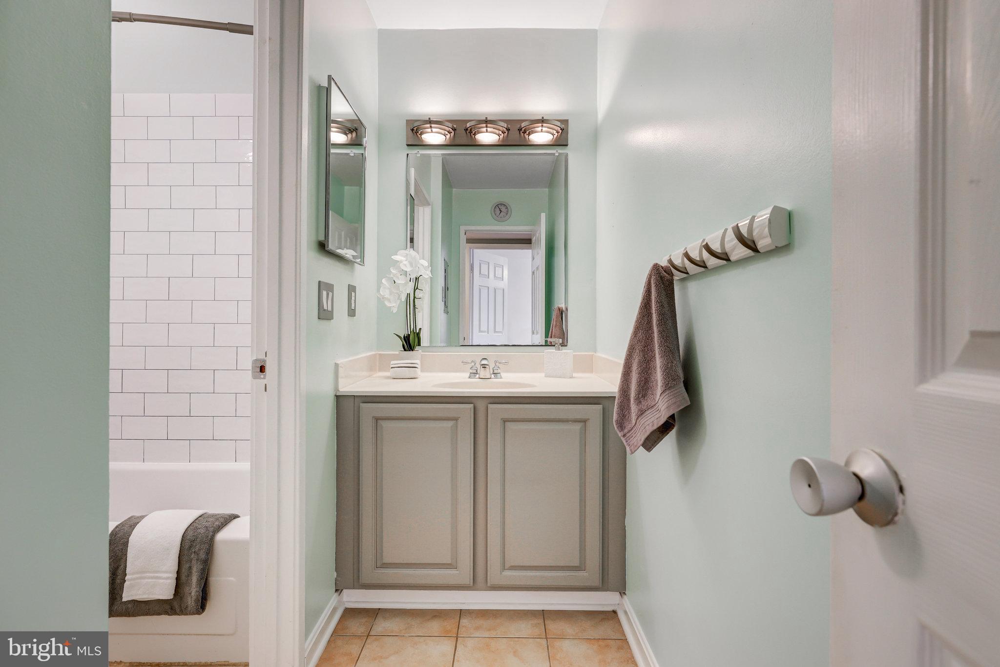 1650 Parkcrest Circle, Unit 101 Reston, VA 20190 - Photo 19 of 40 Updated bathroom