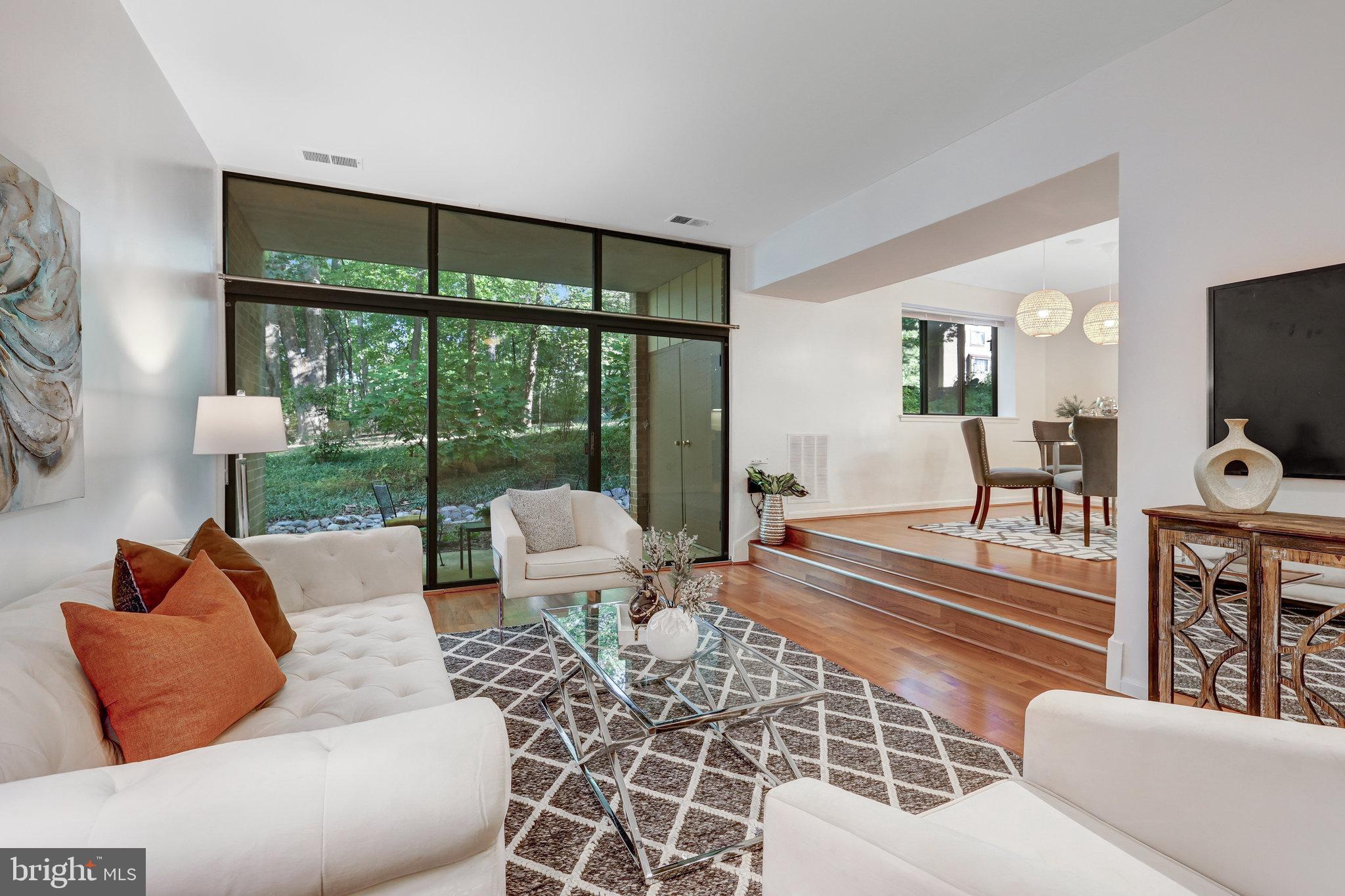 1650 Parkcrest Circle, Unit 101 Reston, VA 20190 - Photo 2 of 40 LR w/floor to ceiling sliding glass to patio