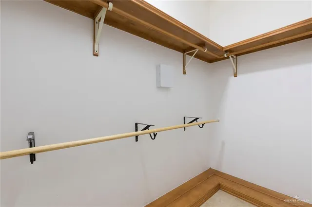 a view of a room with racks on the wall