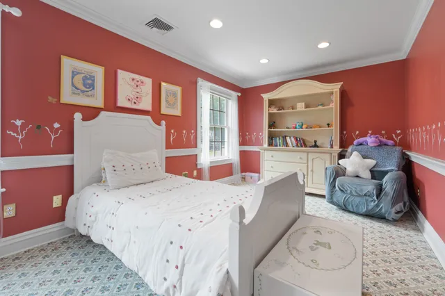 a bathroom with a tub double vanity sink and mirror