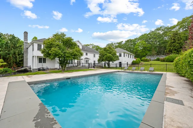 a view of a swimming pool with a garden